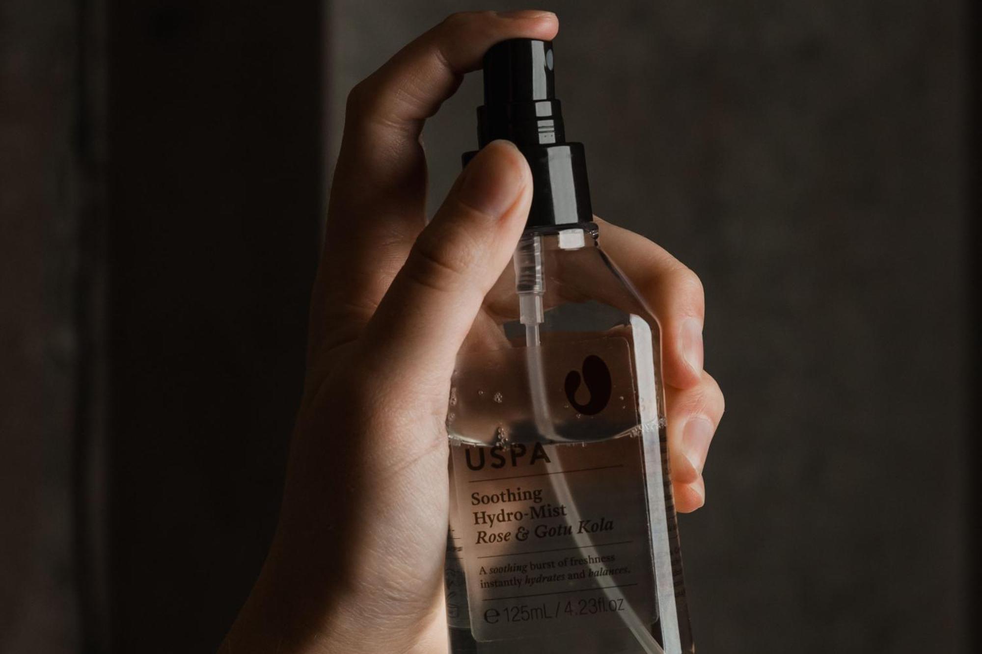 Peppers Silo Hotel Launceston Bagian luar foto A woman using a facial mist